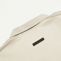 Camisa Polo Fear of God “Bege”
